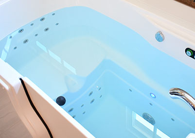 Photo of a walk-in tub showing the air jets